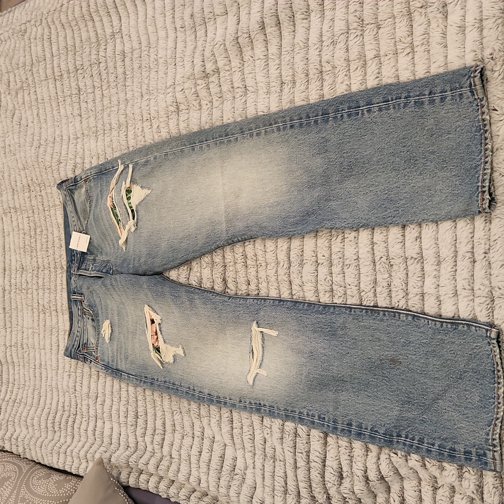 Levis straight leg, distressed button down jeans with floral patches size 10